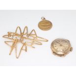 A yellow metal 9ct freeform brooch, a lady's 9ct yellow gold wristwatch and a ditto charm