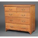 A Victorian Art Nouveau aesthetic movement pitched pine chest of 2 short and 3 long drawers with