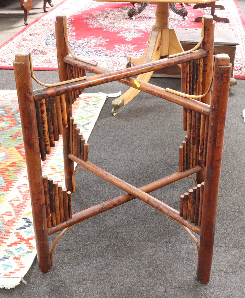 A 1930's Art Deco circular folding bamboo table raised on turned supports with X framed stretcher - Image 4 of 5