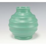 A Keith Murray Wedgwood mid-green deep ribbed vase 16cm