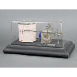 Casella, a barograph contained in a metal case with perspex cover 18cm h x 33cm w x 20cm d