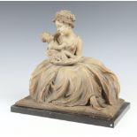 J. Dommisse, an earthenware figure of a seated lady with child, the reverse marked Made in Belgium J