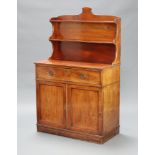 Wilkinsons, a Regency mahogany secretaire chiffonier, the shaped raised back fitted 2 shelves, the