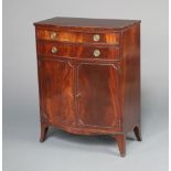 A Georgian style mahogany bow front cabinet fitted 2 drawers above a panelled door, raised on