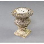 A carved stone urn of baluster form on a square base 30cm h x 25cm 4cm chip to side