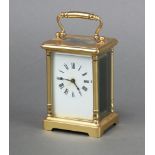 A 19th/20th Century carriage timepiece with 6cm enamelled dial, Roman numerals, contained in a