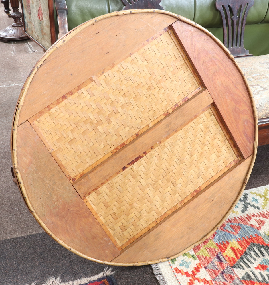 A 1930's Art Deco circular folding bamboo table raised on turned supports with X framed stretcher - Image 5 of 5