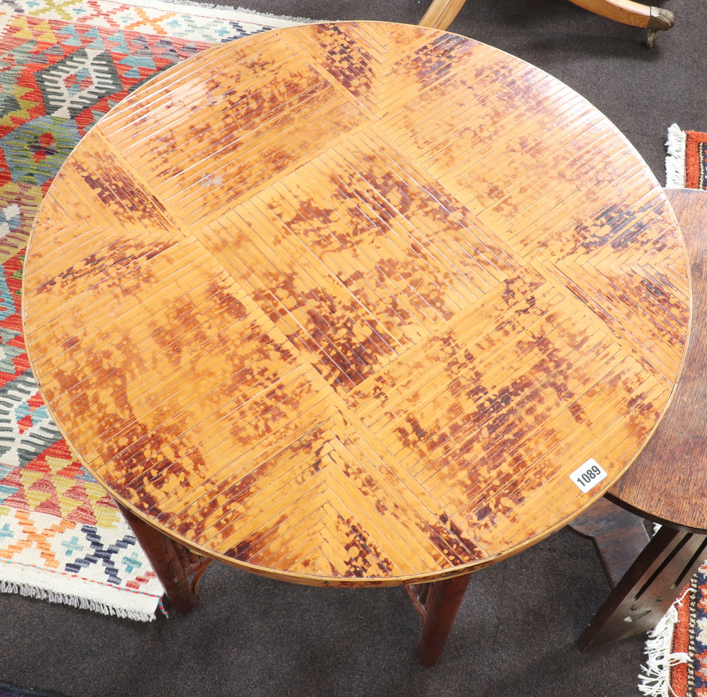 A 1930's Art Deco circular folding bamboo table raised on turned supports with X framed stretcher - Image 2 of 5