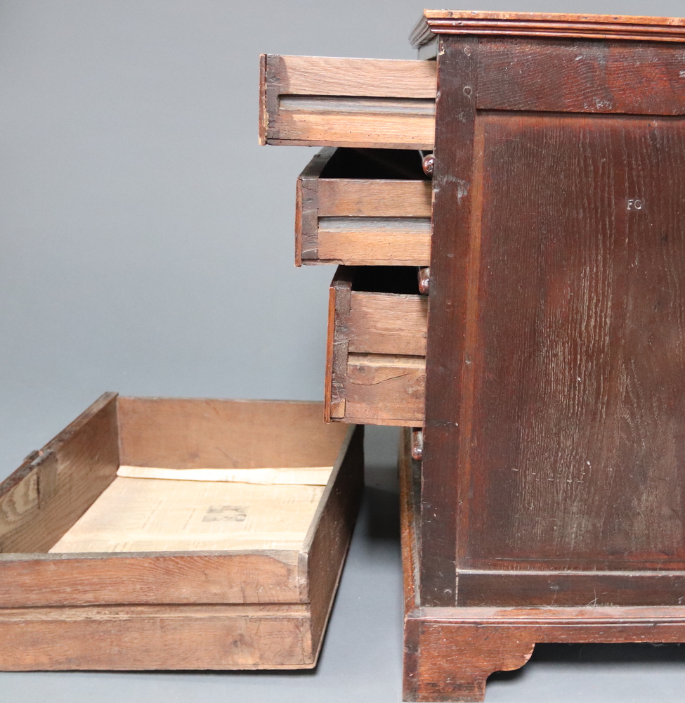 A Queen Anne oak chest of 4 long drawers with original brass pin drop handles, crowned brass - Image 3 of 10