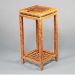 A 19th Century Chinese square hardwood jardiniere stand with lattice work undertier 78cm h x 37cm