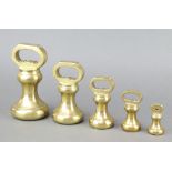 Five various brass bell weights - 7lbs, 4lbs, 2lbs, 1lb and 8 ozs