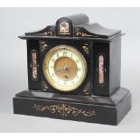 A Victorian French timepiece with 10cm enamelled dial, Arabic numerals, contained in a 2 colour