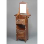 An Edwardian mahogany ships style dressing table with rectangular bevelled plate mirror to the