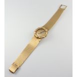 A lady's 18ct yellow gold Jaeger Le Coultre wristwatch contained in a bamboo effect 25mm case