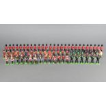 28 Britains metal figures of guardsmen, 7 ditto Yeoman of the Guard, 6 Highland Pipers, 8