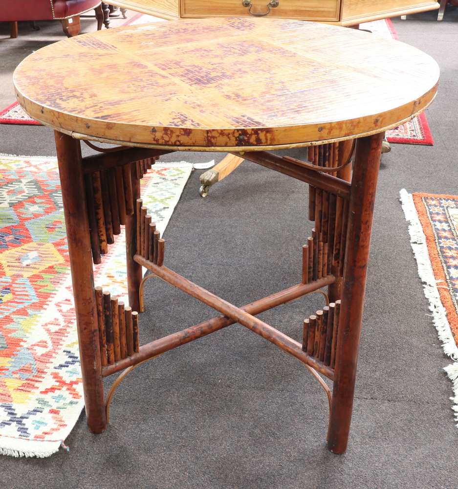 A 1930's Art Deco circular folding bamboo table raised on turned supports with X framed stretcher - Image 3 of 5