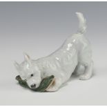 A Royal Copenhagen figure of a puppy playing with a slipper 145, 9cm