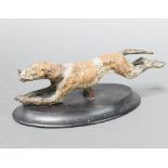 A cold painted bronze figure of a running hound raised on an oval base 5cm x 23cm x 3cm There is