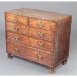 An 18th Century bleached oak chest of 2 short and 3 long drawers with replacement brass drop