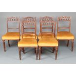 A set of 6 Victorian carved walnut bar back dining chairs with bobbin turned decoration and