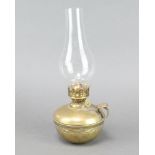 A Hare's brass ships style self righting safety oil lamp with clear glass chimney 13cm