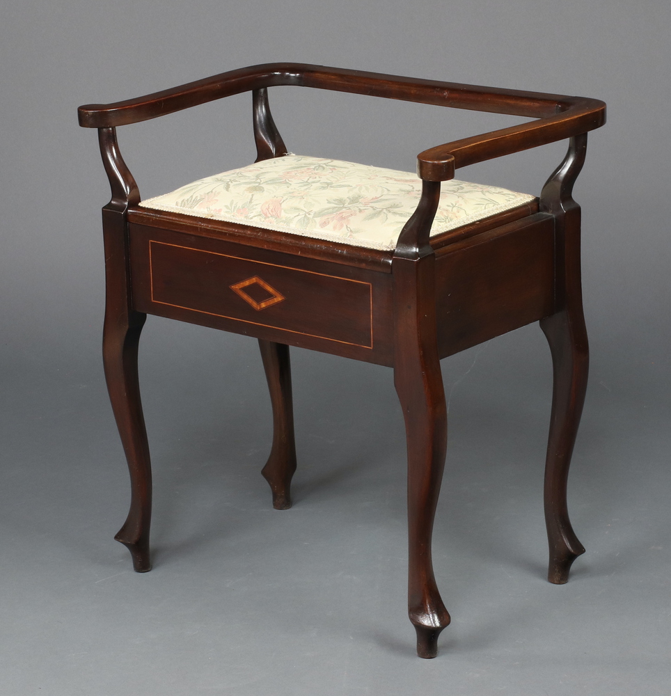 An Edwardian inlaid mahogany box seat piano stool with hinged lid, raised on cabriole supports