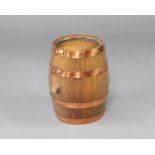 A coopered oak barrel 37cm h x 24cm diam.