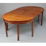 A Georgian mahogany D end dining table with 2 extra leaves, raised on 8 square supports 71cm h x