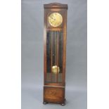 An Edwardian German 8 day striking chiming longcase clock with 26cm brass dial, Arabic numerals
