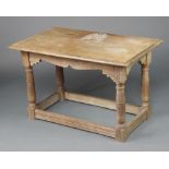 An 18th Century style oak side table, raised on turned supports with box framed stretcher, marked