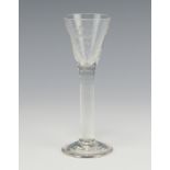 A George III glass cordial with engraved decoration 15cm