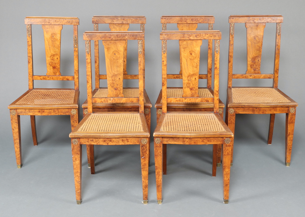 A set of 6 19th Century French walnut slat back dining chairs with gilt metal mounts and woven