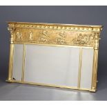 A Regency style triple plate over mantel mirror contained in a ball studded frame with reeded