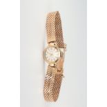 A lady's 18ct yellow gold Sarcar wristwatch on a yellow metal mesh strap