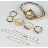 A lady's 9ct yellow gold wristwatch, a pair of earrings and minor gold jewellery, weighable gold 7.6