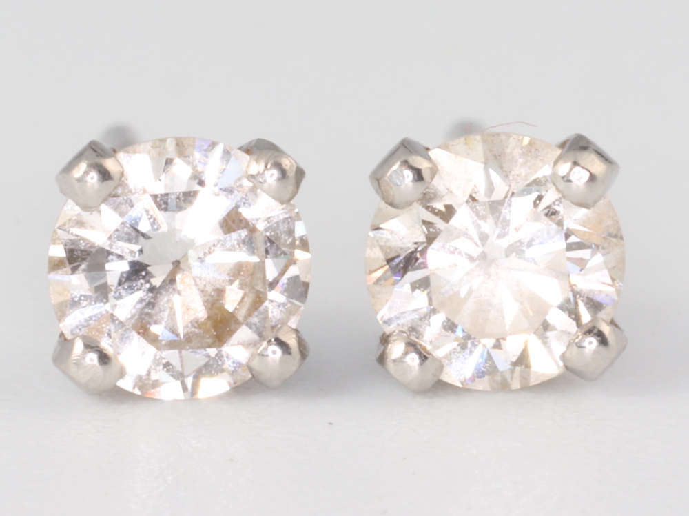 A pair of white metal single stone brilliant cut diamond ear studs, each approx 0.5ct - Image 3 of 3