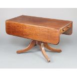 A large 19th Century mahogany pedestal Pembroke table, fitted a frieze drawer, raised on a turned