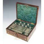 A mid Victorian brass bound rosewood toilet box with fitted interior, the drop flap revealing a
