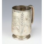 A Victorian silver mug engraved with a carrot and radish and inscription For The Canterbury Cattle
