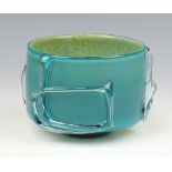 A Mdina blue glass bowl with wavy decoration 9cm