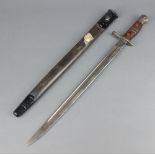 A 1913 Remington bayonet complete with scabbard