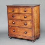 A Victorian mahogany D shaped chest of 2 short and 3 long drawers, raised on bun feet 114cm h x