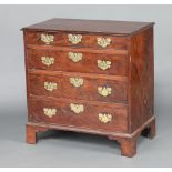 A Georgian yew chest, the top and sides constructed of 3 panels, fitted 4 long drawers with steel