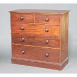 A Victorian mahogany D shaped chest of 2 short and 3 long drawers with turned handles 112cm h x