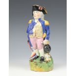A Staffordshire style Victorian jug in the form of standing Nelson 28cm