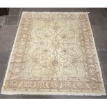 A white and grey ground floral patterned Persian carpet with central medallion 295cm x 241cm