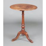 A Victorian oval bleached mahogany wine table, raised on a turned column and tripod base 71cm h x