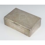 A rectangular silver cigarette box with engraved monogram, rubbed marks, 14cm