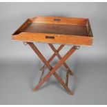 A 19th Century rectangular mahogany butler's tray and folding stand 87cm h x 75cm w x 49cm d There