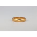 A 22ct yellow gold wedding band 8.7 grams, size N 1.2